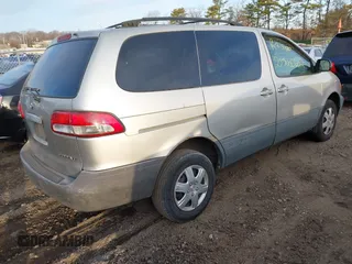2003 Toyota Sienna CE with VIN 4T3ZF19C43U509873, listed as a IAAI auction lot 41784526 with 999,999 mi miles. Bid and sale history available at carsss.com. Image 4.