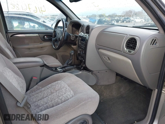 2003 GMC Envoy SLT with VIN 1GKDT13S532308502, listed as a IAAI auction lot 41676188 with 218,626 mi miles. Bid and sale history available at carsss.com. Image 5.
