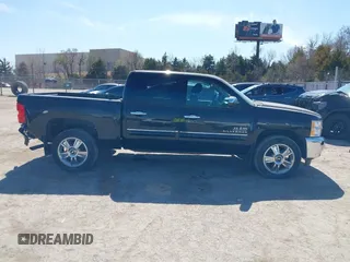 2013 Chevrolet Silverado 1500 LT with VIN 3GCPCSE01DG244414, listed as a IAAI auction lot 41770383 with 162,559 mi miles and . Bid and sale history available at DreamBid. Image 13.