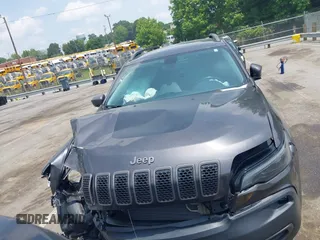 2020 Jeep Cherokee Trailhawk with VIN 1C4PJMBX5LD530720, listed as a IAAI auction lot 42404948 with 99,606 mi miles and . Bid and sale history available at DreamBid. Image 12.