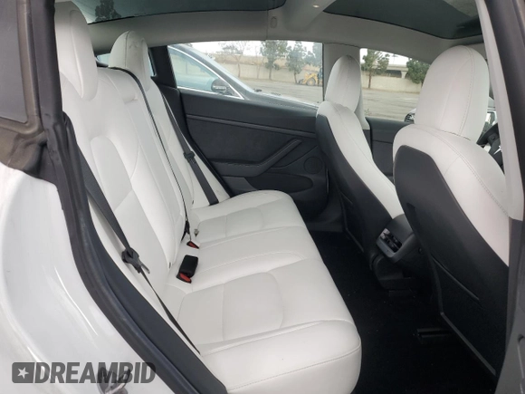 2021 Tesla Model 3 Standard Range Plus with VIN 5YJ3E1EA6MF066064, listed as a Copart auction lot 54063625 with 27,424 mi miles and Salvage Title. Bid and sale history available at DreamBid. Image 10.