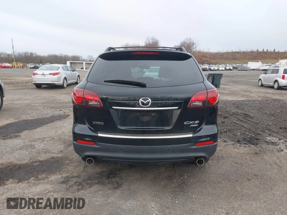 2015 Mazda CX-9 Grand Touring z VIN JM3TB3DV6F0464926, wystawiony jako IAAI lot #42035670 z przebiegiem 168 257 mil mil oraz . Historia ofert i sprzedaży dostępna na DreamBid. Obrazek 16.
