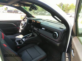 2023 Chevrolet Colorado 4WD Z71 with VIN 1GCPTDEK4P1249624, listed as a IAAI auction lot 42130950 with 9,795 mi miles and . Bid and sale history available at DreamBid. Image 5.