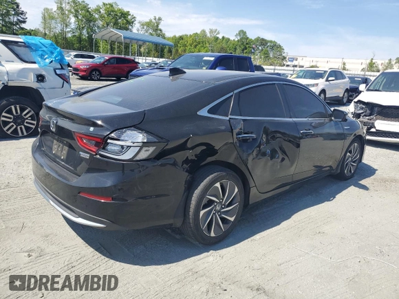 2019 Honda Insight Touring z VIN 19XZE4F97KE019841, wystawiony jako Copart lot #53578335 z przebiegiem 93 672 mil mil oraz Szkoda całkowita • Salvage title. Historia ofert i sprzedaży dostępna na DreamBid. Obrazek 3.