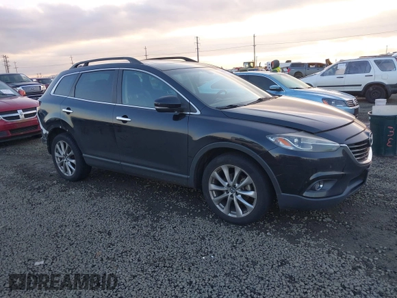 2014 Mazda CX-9 Grand Touring with VIN JM3TB3DV7E0429276, listed as a IAAI auction lot 41415446 with 94,939 mi miles and . Bid and sale history available at DreamBid. Image 1.