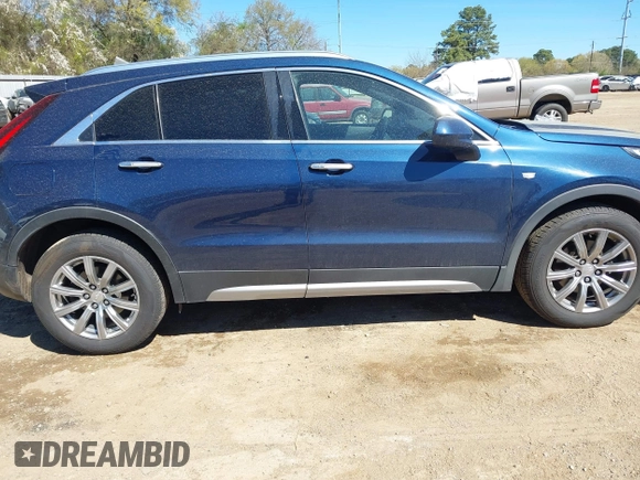 2019 Cadillac XT4 FWD Premium Luxury z VIN 1GYFZCR47KF109394, wystawiony jako IAAI lot #41864606 z przebiegiem 98 425 mil mil oraz . Historia ofert i sprzedaży dostępna na DreamBid. Obrazek 13.