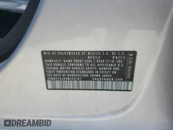 2013 Volkswagen Jetta SE z VIN 3VWDX7AJ6DM452161, wystawiony jako Copart lot #60510695 z przebiegiem Nie podano mil oraz Szkoda całkowita • Salvage title. Historia ofert i sprzedaży dostępna na DreamBid. Obrazek 12.