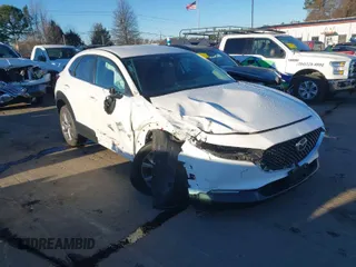 2021 Mazda CX-30 Select z VIN 3MVDMBBL0MM218479, wystawiony jako IAAI lot #41254087 z przebiegiem 11 493 mil mil oraz . Historia ofert i sprzedaży dostępna na DreamBid. Obrazek 1.