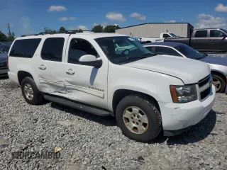2013 Chevrolet Suburban LT with VIN 1GNSCJE0XDR146798, listed as a Copart auction lot 62408525 with 218,484 mi miles and Salvage title. Bid and sale history available at DreamBid. Image 4.