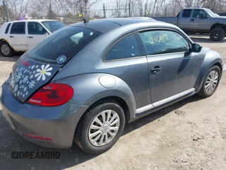 2012 Volkswagen Beetle Entry PZEV with VIN 3VWFP7AT7CM644732, listed as a IAAI auction lot 41864458 with 134,073 mi miles. Bid and sale history available at carsss.com. Image 4.