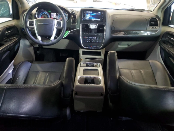2016 Chrysler Town & Country Touring L Anniversary Edition with VIN 2C4RC1CG3GR284592, listed as a Copart auction lot 62499194 with 98,428 mi miles and Salvage Title. Bid and sale history available at DreamBid. Image 8.