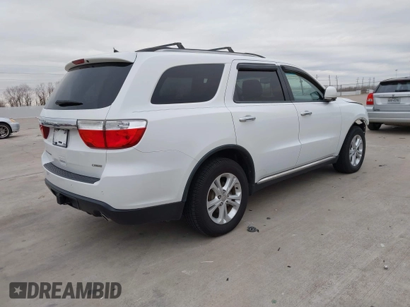 2013 Dodge Durango Crew with VIN 1C4RDHDG5DC617061, listed as a IAAI auction lot 41385801 with 142,304 mi miles. Bid and sale history available at carsss.com. Image 4.