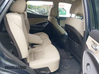 2017 Hyundai Santa Fe 2.4L z VIN 5XYZUDLB0HG418726, wystawiony jako IAAI lot #42375177 z przebiegiem 159 118 mil mil oraz . Historia ofert i sprzedaży dostępna na DreamBid. Obrazek 8.