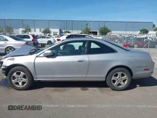2000 Honda Accord EX z VIN 1HGCG2257YA010383, wystawiony jako IAAI lot #42278620 z przebiegiem 170 757 mil mil oraz . Historia ofert i sprzedaży dostępna na DreamBid. Obrazek 15.