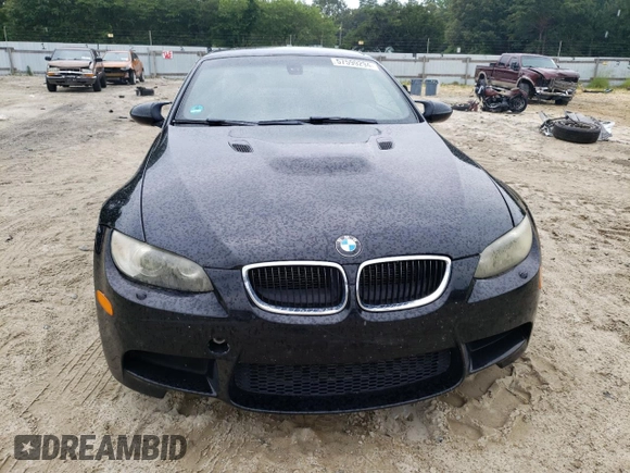 2011 BMW M3 with VIN WBSDX9C54BE584619, listed as a Copart auction lot 57599294 with 130,976 mi miles and Salvage Title. Bid and sale history available at carsss.com. Image 5.