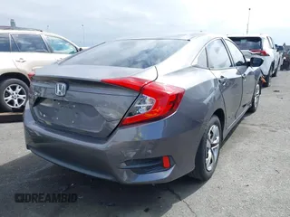 2018 Honda Civic LX with VIN 2HGFC2F58JH514161, listed as a IAAI auction lot 42073133 with 117,658 mi miles. Bid and sale history available at carsss.com. Image 4.