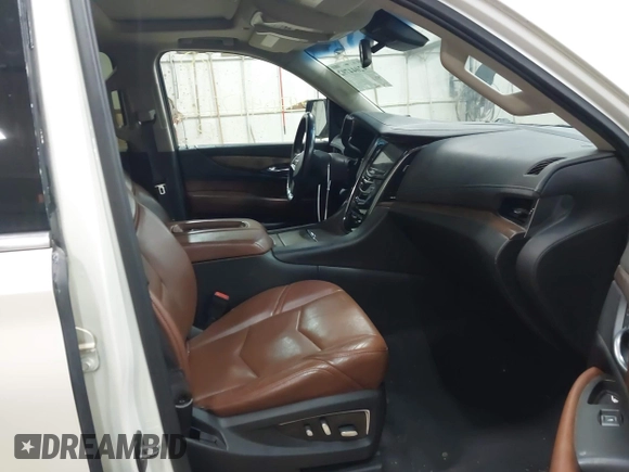 2015 Cadillac Escalade Luxury z VIN 1GYS4MKJ0FR566796, wystawiony jako IAAI lot #42044792 z przebiegiem 176 162 mil mil oraz . Historia ofert i sprzedaży dostępna na DreamBid. Obrazek 5.