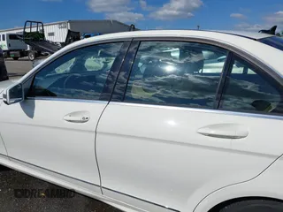 2012 Mercedes-Benz C with VIN WDDGF8BB9CR230328, listed as a IAAI auction lot 42024792 with 129,739 mi miles. Bid and sale history available at carsss.com. Image 14.