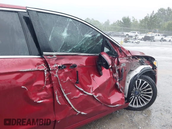 2018 Ford Fusion Titanium with VIN 3FA6P0D91JR233679, listed as a IAAI auction lot 42182140 with 100,706 mi miles and . Bid and sale history available at DreamBid. Image 6.