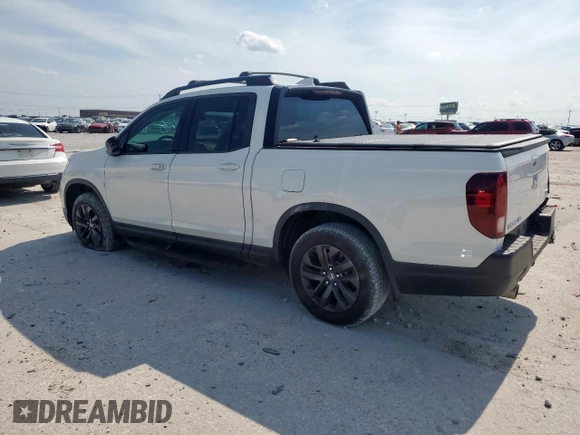 2021 Honda Ridgeline Sport with VIN 5FPYK3F13MB002628, listed as a Copart auction lot 59180075 with 79,454 mi miles and Salvage title. Bid and sale history available at DreamBid. Image 2.