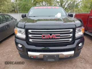 2017 GMC Canyon 4WD SLE z VIN 1GTG6CEN9H1140962, wystawiony jako IAAI lot #42251320 z przebiegiem 142 099 mil mil oraz . Historia ofert i sprzedaży dostępna na DreamBid. Obrazek 12.