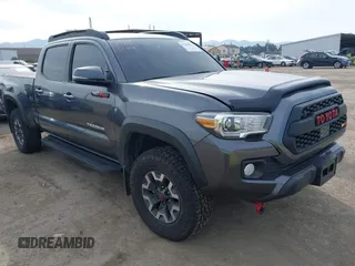 2021 Toyota Tacoma 4WD SR5 with VIN 3TMDZ5BN5MM110218, listed as a IAAI auction lot 41430303 with 47,781 mi miles. Bid and sale history available at carsss.com. Image 1.