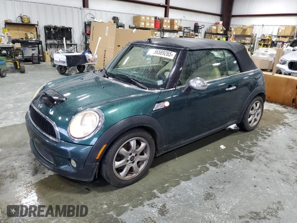 2010 MINI Convertible S with VIN WMWMS3C54ATY51980, listed as a Copart auction lot 56589265 with 147,136 mi miles and Salvage title. Bid and sale history available at DreamBid. Image 1.