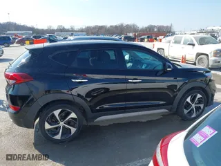 2017 Hyundai Tucson Value with VIN KM8J33A25HU586191, listed as a IAAI auction lot 41682127 with 58,877 mi miles. Bid and sale history available at carsss.com. Image 13.
