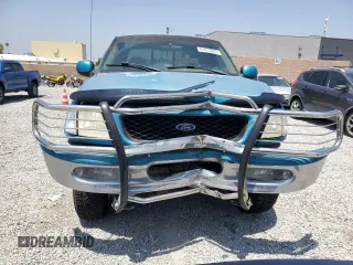 1998 Ford F-250 z VIN 1FTPX28L0WKB51597, wystawiony jako Copart lot #61813065 z przebiegiem 206 958 mil mil oraz Szkoda całkowita • Salvage title. Historia ofert i sprzedaży dostępna na DreamBid. Obrazek 5.
