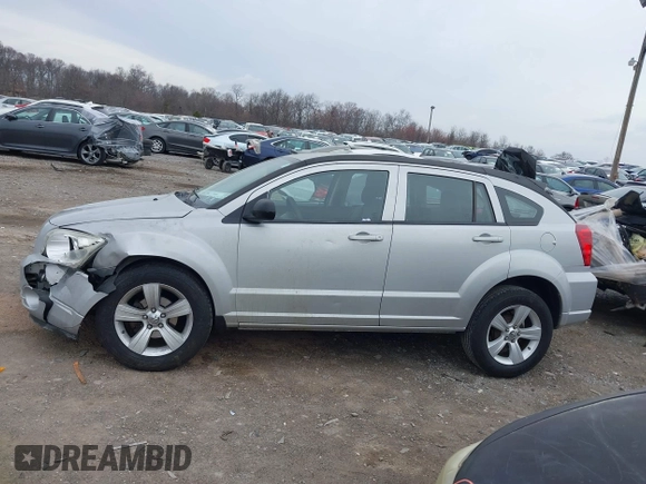 2011 Dodge Caliber Mainstreet with VIN 1B3CB3HA2BD238032, listed as a IAAI auction lot 41865918 with 98,022 mi miles and . Bid and sale history available at DreamBid. Image 14.