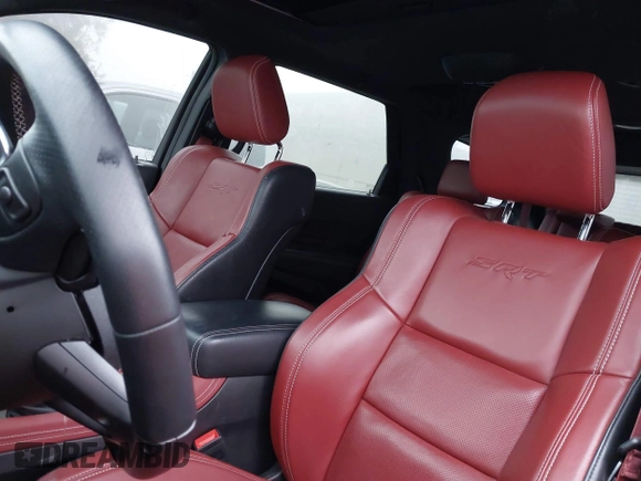 2023 Dodge Durango SRT 392 Premium with VIN 1C4SDJGJ6PC557943, listed as a IAAI auction lot 41478480 with 13,733 mi miles and . Bid and sale history available at DreamBid. Image 19.