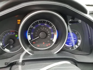 2015 Honda Fit EX-L z VIN 3HGGK5H85FM763929, wystawiony jako Copart lot #60808125 z przebiegiem 79 441 mil mil oraz Szkoda całkowita • Salvage title. Historia ofert i sprzedaży dostępna na DreamBid. Obrazek 9.