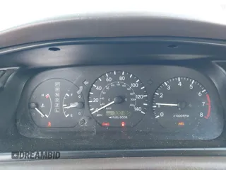 2000 Toyota Camry LE z VIN JT2BF22K5Y0258522, wystawiony jako IAAI lot #41998874 z przebiegiem 300 186 mil mil oraz . Historia ofert i sprzedaży dostępna na DreamBid. Obrazek 7.