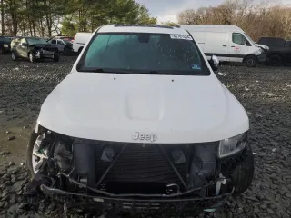2014 Jeep Grand Cherokee Limited z VIN 1C4RJFBG8EC129868, wystawiony jako Copart lot #86781534 z przebiegiem 99 316 mil mil oraz Szkoda całkowita • Salvage title. Historia ofert i sprzedaży dostępna na DreamBid. Obrazek 5.