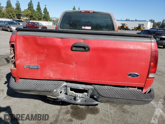 2000 Ford F-150 XL with VIN 1FTZX1721YNA67771, listed as a Copart auction lot 41439795 with 0 mi miles and Salvage Title. Bid and sale history available at carsss.com. Image 6.