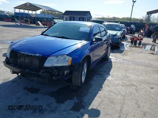 2013 Dodge Avenger SE with VIN 1C3CDZAB6DN653869, listed as a IAAI auction lot 41984957 with 163,626 mi miles. Bid and sale history available at carsss.com. Image 18.