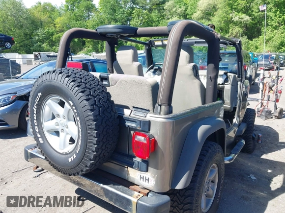 2005 Jeep Wrangler X with VIN 1J4FA39S15P305528, listed as a IAAI auction lot 42288177 with 189,767 mi miles and . Bid and sale history available at DreamBid. Image 4.