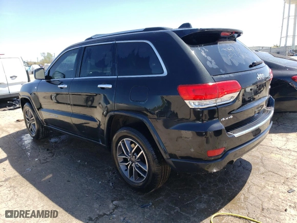 2014 Jeep Grand Cherokee Limited with VIN 1C4RJFBG5EC208981, listed as a Copart auction lot 52401974 with 138,620 mi miles and Clean Title. Bid and sale history available at carsss.com. Image 2.