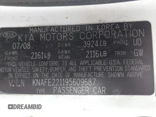 2009 Kia Spectra EX with VIN KNAFE221195609687, listed as a IAAI auction lot 42138825 with 105,170 mi miles. Bid and sale history available at carsss.com. Image 9.