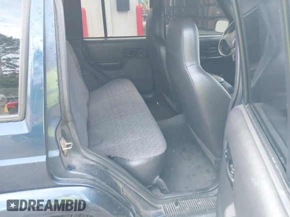 2001 Jeep Cherokee Sport with VIN 1J4FT48S71L525856, listed as a IAAI auction lot 42349383 with 218,122 mi miles and . Bid and sale history available at DreamBid. Image 8.