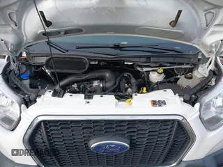 2021 Ford Transit Cargo with VIN 1FTBR1Y81MKA25014, listed as a IAAI auction lot 41594717 with 49,983 mi miles and . Bid and sale history available at DreamBid. Image 10.