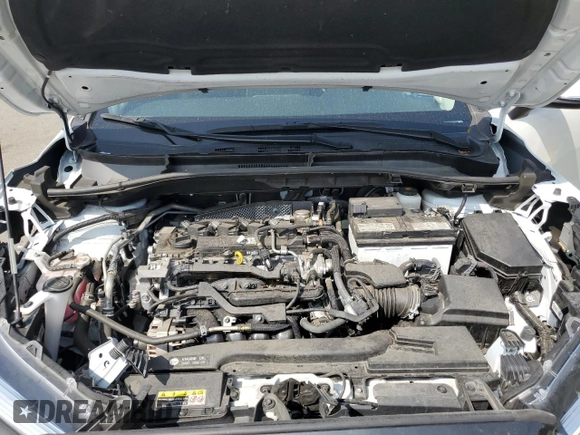 2023 Toyota Corolla Cross XLE with VIN 7MUDAAAG2PV042957, listed as a Copart auction lot 60301555 with 39,211 mi miles and Salvage title. Bid and sale history available at DreamBid. Image 12.