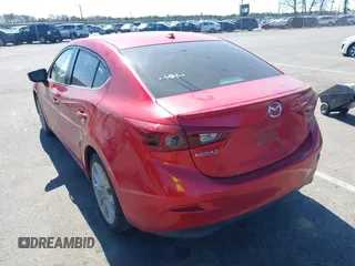 2014 Mazda 3 S Grand Touring with VIN JM1BM1W32E1107542, listed as a IAAI auction lot 42070484 with 132,395 mi miles and . Bid and sale history available at DreamBid. Image 3.