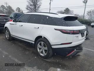 2018 Land Rover Range Rover Velar S z VIN SALYB2RX5JA722934, wystawiony jako IAAI lot #41620738 z przebiegiem 96 804 mil mil oraz . Historia ofert i sprzedaży dostępna na DreamBid. Obrazek 3.