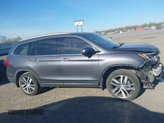 2017 Honda Pilot Touring with VIN 5FNYF5H97HB023919, listed as a IAAI auction lot 41864959 with 70,360 mi miles. Bid and sale history available at carsss.com. Image 13.
