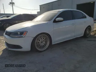 2014 Volkswagen Jetta SE z VIN 3VWD07AJ5EM283160, wystawiony jako Copart lot #42599815 z przebiegiem 210 295 mil mil oraz Szkoda całkowita • Salvage title. Historia ofert i sprzedaży dostępna na DreamBid. Obrazek 1.