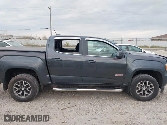 2016 GMC Canyon 4WD SLE with VIN 1GTG6CE38G1165896, listed as a IAAI auction lot 40716621 with 116,684 mi miles. Bid and sale history available at carsss.com. Image 13.
