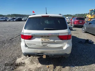 2013 Dodge Durango Citadel with VIN 1C4SDHET0DC571961, listed as a IAAI auction lot 42050261 with 257,637 mi miles and . Bid and sale history available at DreamBid. Image 16.