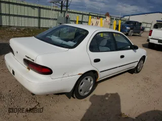 1996 Geo Prizm z VIN 1Y1SK5261TZ028032, wystawiony jako Copart lot #77434654 z przebiegiem 54 665 mil mil oraz Tytuł czysty. Historia ofert i sprzedaży dostępna na DreamBid. Obrazek 3.