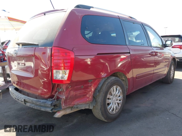 2012 Kia Sedona LX with VIN KNDMG4C70C6443649, listed as a IAAI auction lot 41662007 with 208,575 mi miles. Bid and sale history available at carsss.com. Image 4.